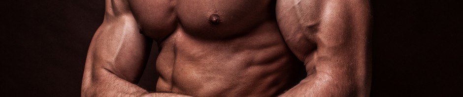 Muscled male model showing his hand