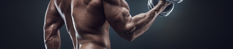 Handsome power athletic man in training pumping up muscles with dumbbells. Strong bodybuilder with six pack, perfect abs, shoulders, biceps, triceps and chest.